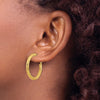 Gold Twisted Diamond-cut Omega Back Hoop Earrings