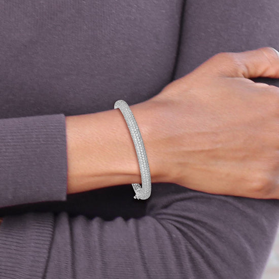 Sterling Shimmer Sterling Silver Rhodium-plated 303 Stone CZ Pav‚ Hinged Bangle