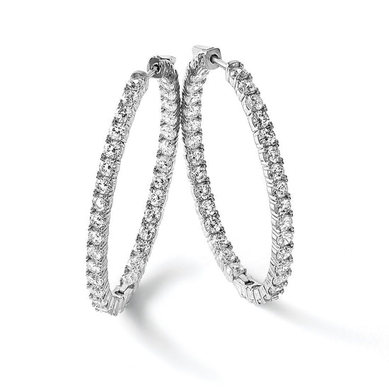 Sterling Shimmer Sterling Silver Rhodium-plated 66 Stone 3.0mm CZ In and Out Oval Hinged Hoop Earrings