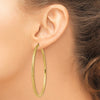 14k 3x65mm Diamond-cut Round Tube Hoop Earrings
