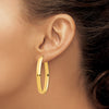14k 5x44mm High Polished Oval Tube Hoop Earrings