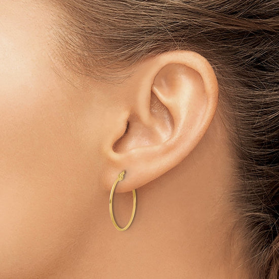 14K 1.1x23mm Polished Knife-Edge Tube Hoop Earrings