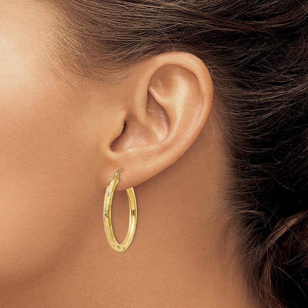 Gold Patterned Diamond-cut Hoop Earrings