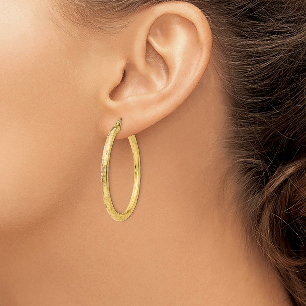Gold Patterned Diamond-cut Hoop Earrings