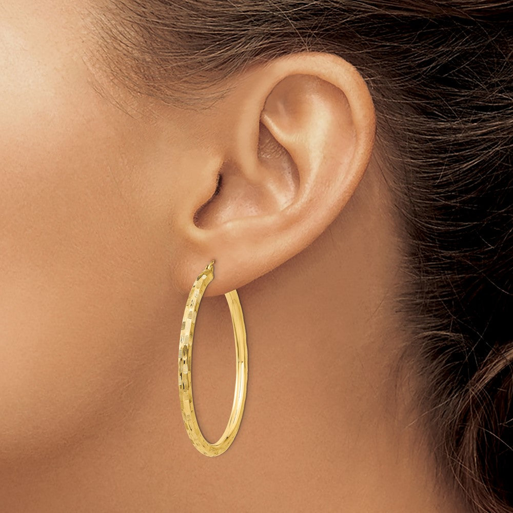 Gold Patterned Diamond-cut Hoop Earrings