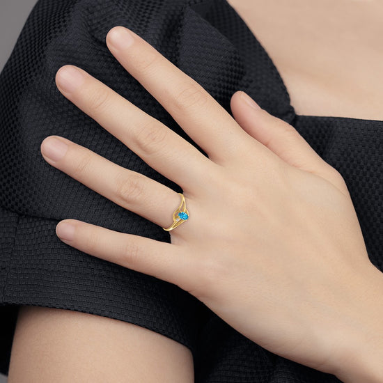 14k 5x3mm Oval Blue Topaz and AA Diamond Ring