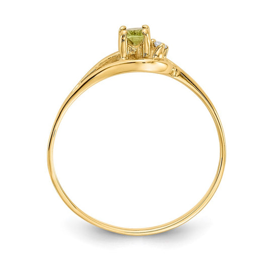 14k 5x3mm Oval Peridot and A Diamond Ring
