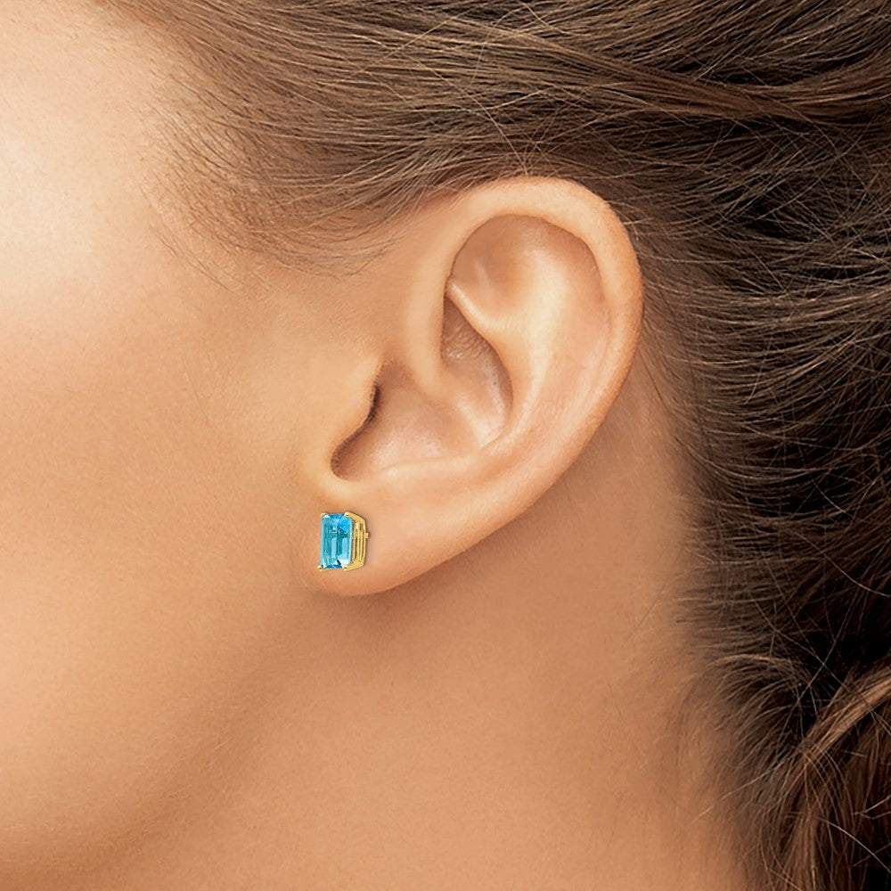14k 7x5mm Emerald-Cut Blue Topaz Post Earrings