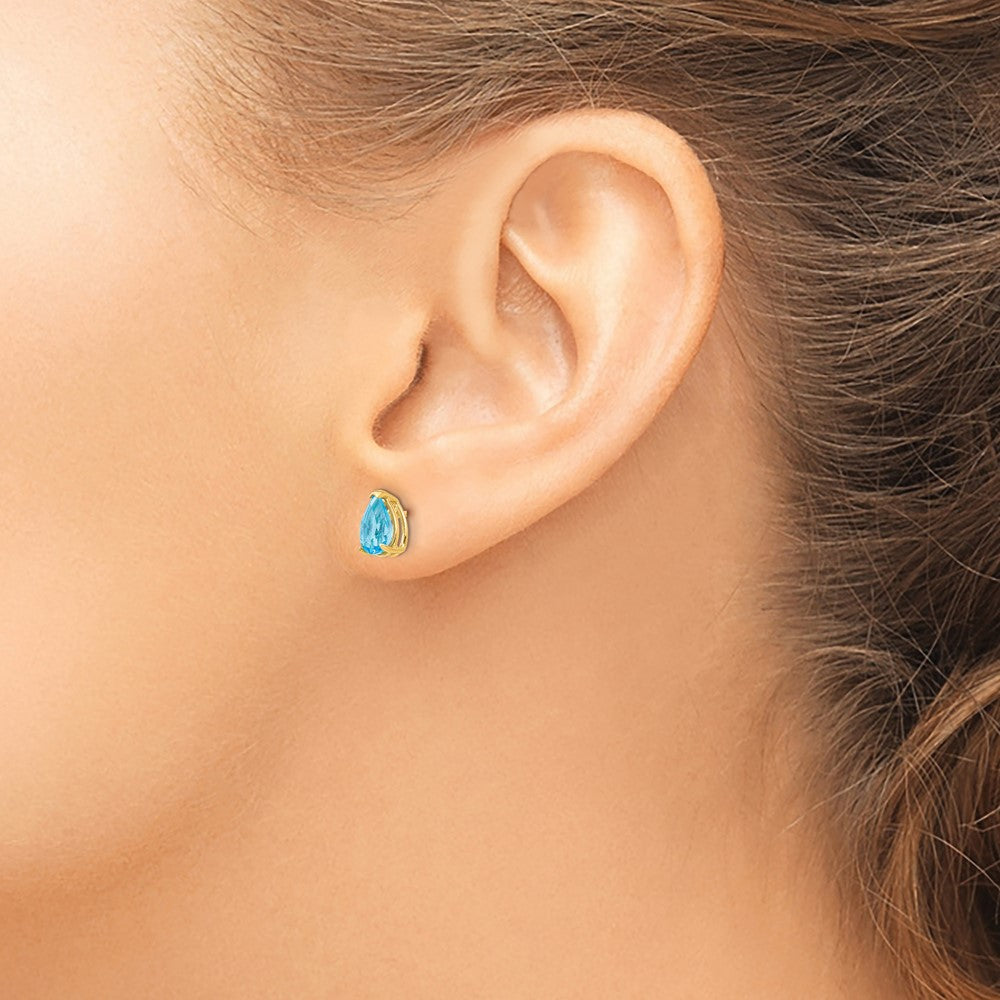 14k 7x5mm Pear Blue Topaz Post Earrings