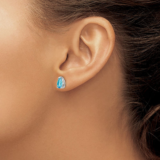 14k White Gold 8x5mm Pear Blue Topaz Post Earrings
