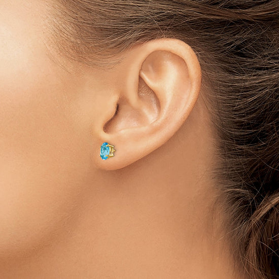 14k 7x5mm Oval Blue Topaz Post Earrings