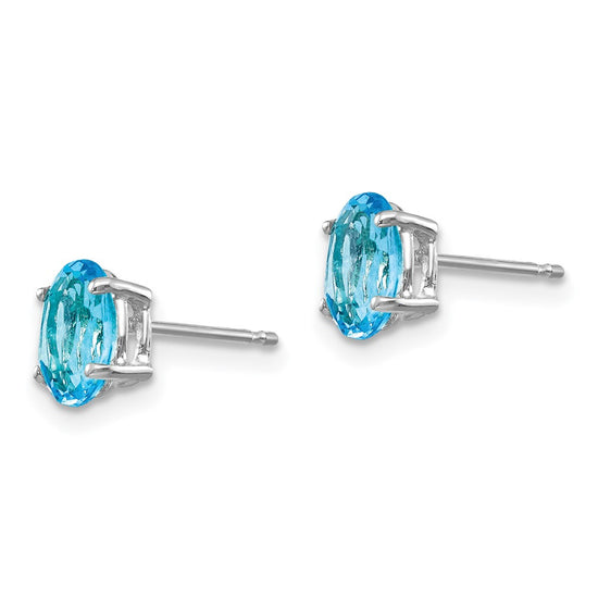 14k White Gold 7x5mm Oval Blue Topaz Post Earrings