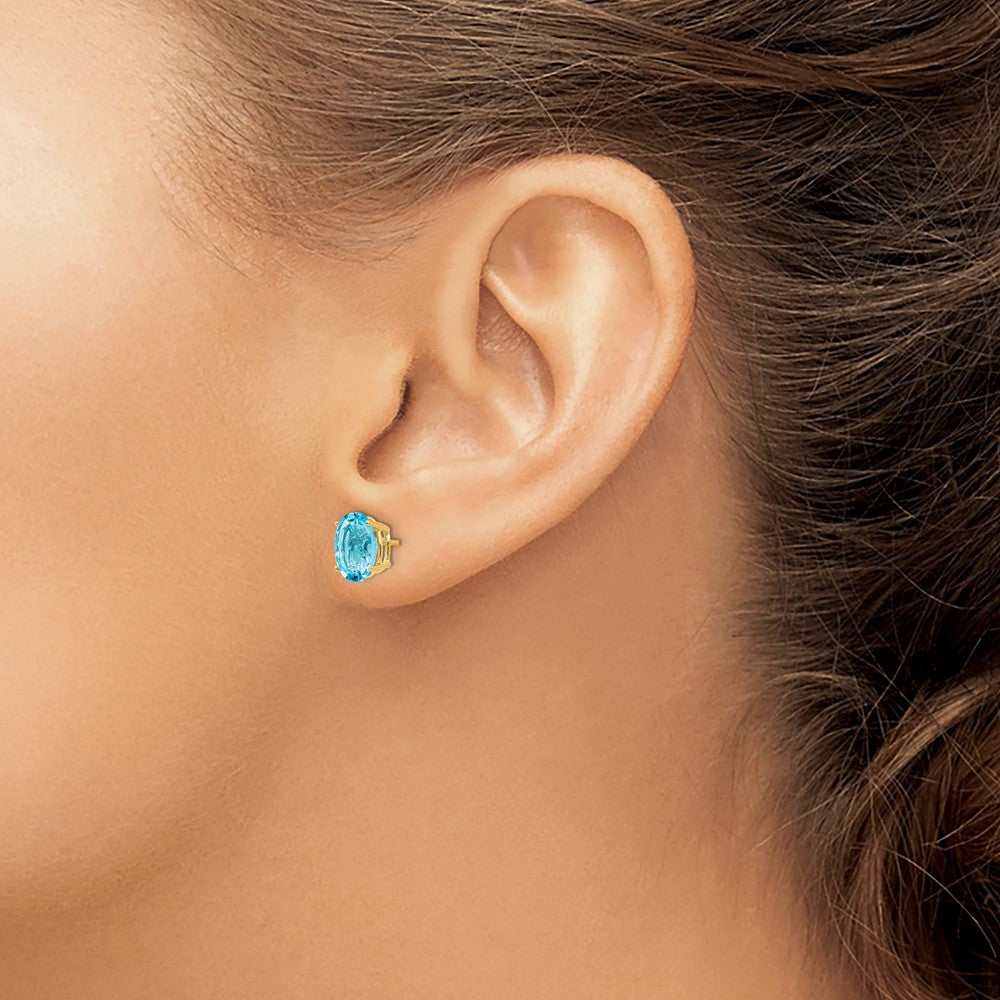14k 8x6mm Oval Blue Topaz Post Earrings